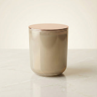 Beachside Dream – Staycation beach-inspired premium coconut apricot wax candle in luminous iridescent medium beige glass vessel topped with elegant rose gold lid