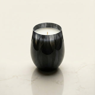 Earth’s Embrace Feng Shui earth element luxury candle in hand-painted glossy obsidian black glass vessel on ivory background
