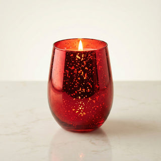 Ember Allure Feng Shui fire element luxury candle lit with glowing flame in handcrafted red speckled mercury glass vessel