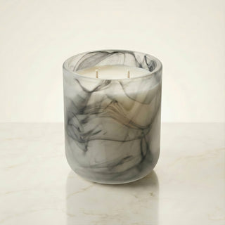 Glory Strength Shadow Light 2-wick luxury candle in a black marbled glass vessel, unlit product shot on a white marble surface, Yin and Yang Collection
